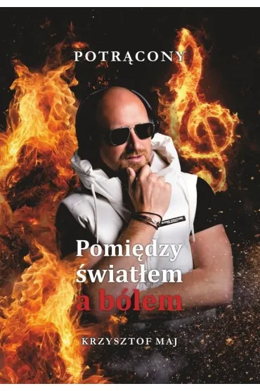 Pomi�dzy �wiat�em a b�lem - Krzysztof  Maj Potr�cony