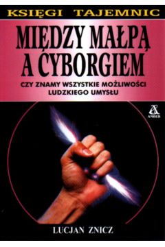 Mi�dzy ma�p� a cyborgiem - Znicz Lucjan - Lucjan Znicz