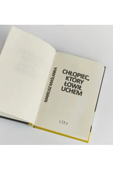 Ch�opiec, kt�ry �owi� uchem - Mariusz Ma�lanka